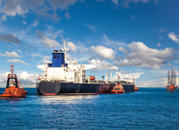 Tanker and tugboats 